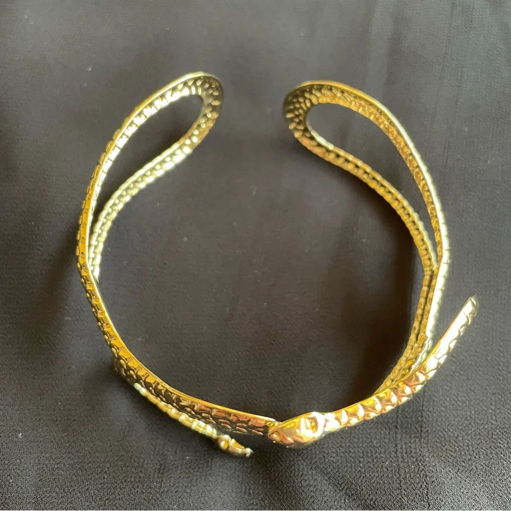 Gold tone metal snake arm cuff